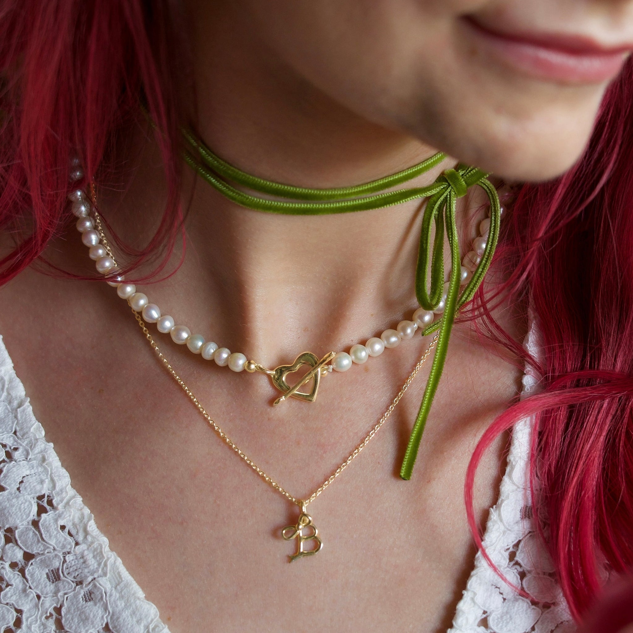 ネックレス・ペンダント [fillow] big pearl cupid necklace Cupid's Pearl Necklace – Romantic Pearls with Heart Bow and