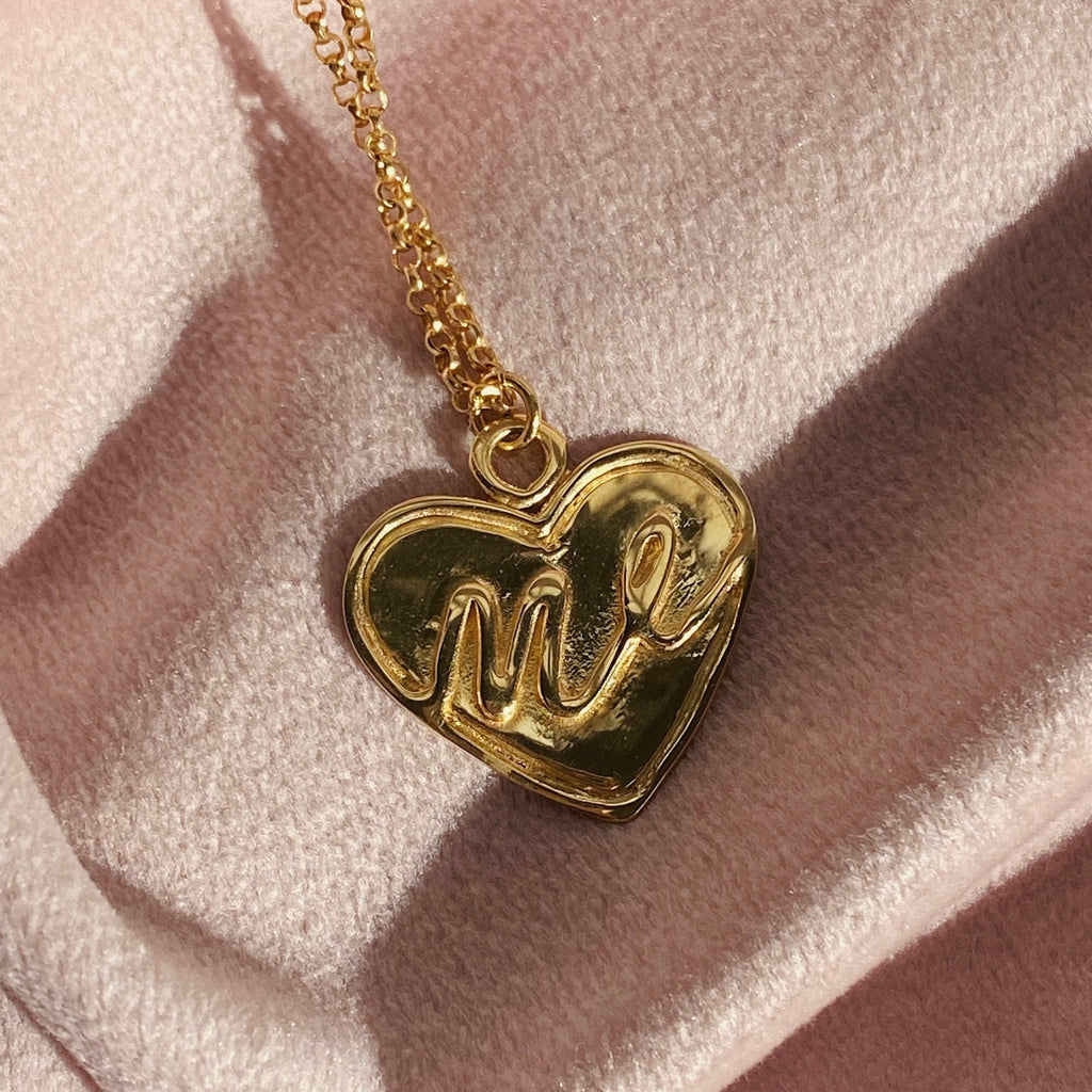 gold vermeil heart necklace with the words me in 3d