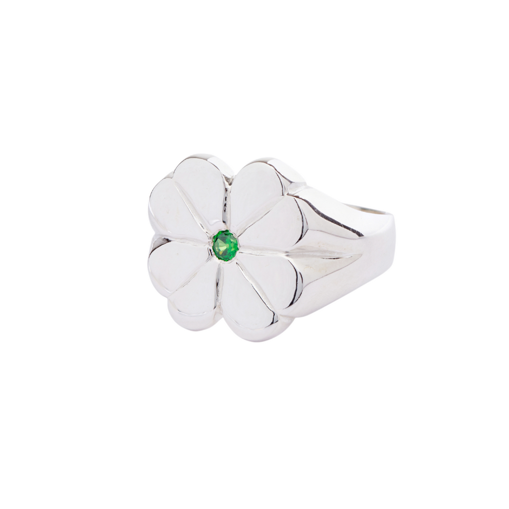 four leaf clover ring with green gemstone